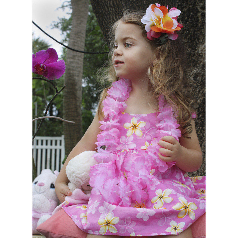 Girls Sweet Leilani bungee Dress - Model sitting with lei and hair flower