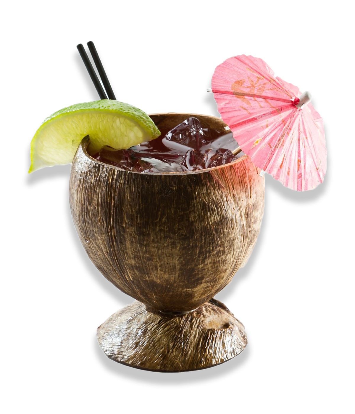 Refreshing summer drink served in a coconut shell garnished with a lime and a parasol.