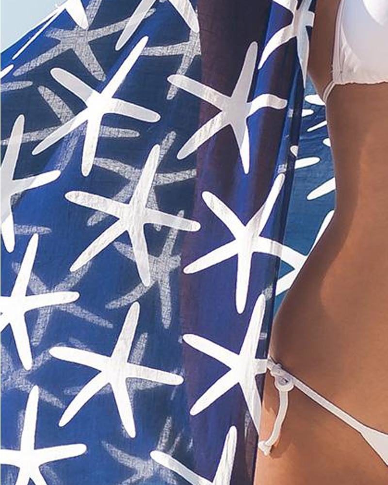 Starfish Sarong navy – Model wearing draped pver her shoulders. Close-up