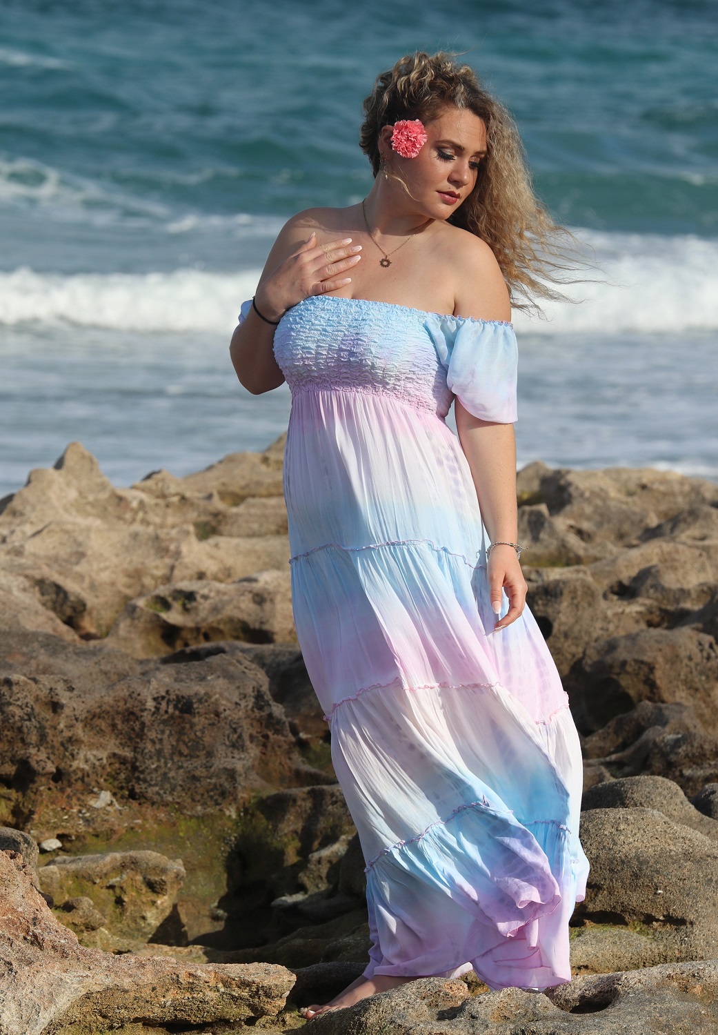 Sexy Off the Shoulder Tropical Sundress – Romance by the Sea – Pastel Palet – Model on Rocks at the beach
