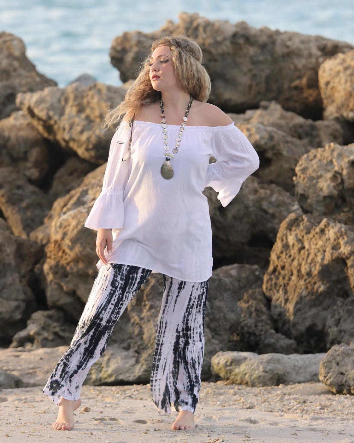 Gypsy-beach-pants-Waikiki-Black-and-white-Model-with-Harmony-Blouse-on-Beach