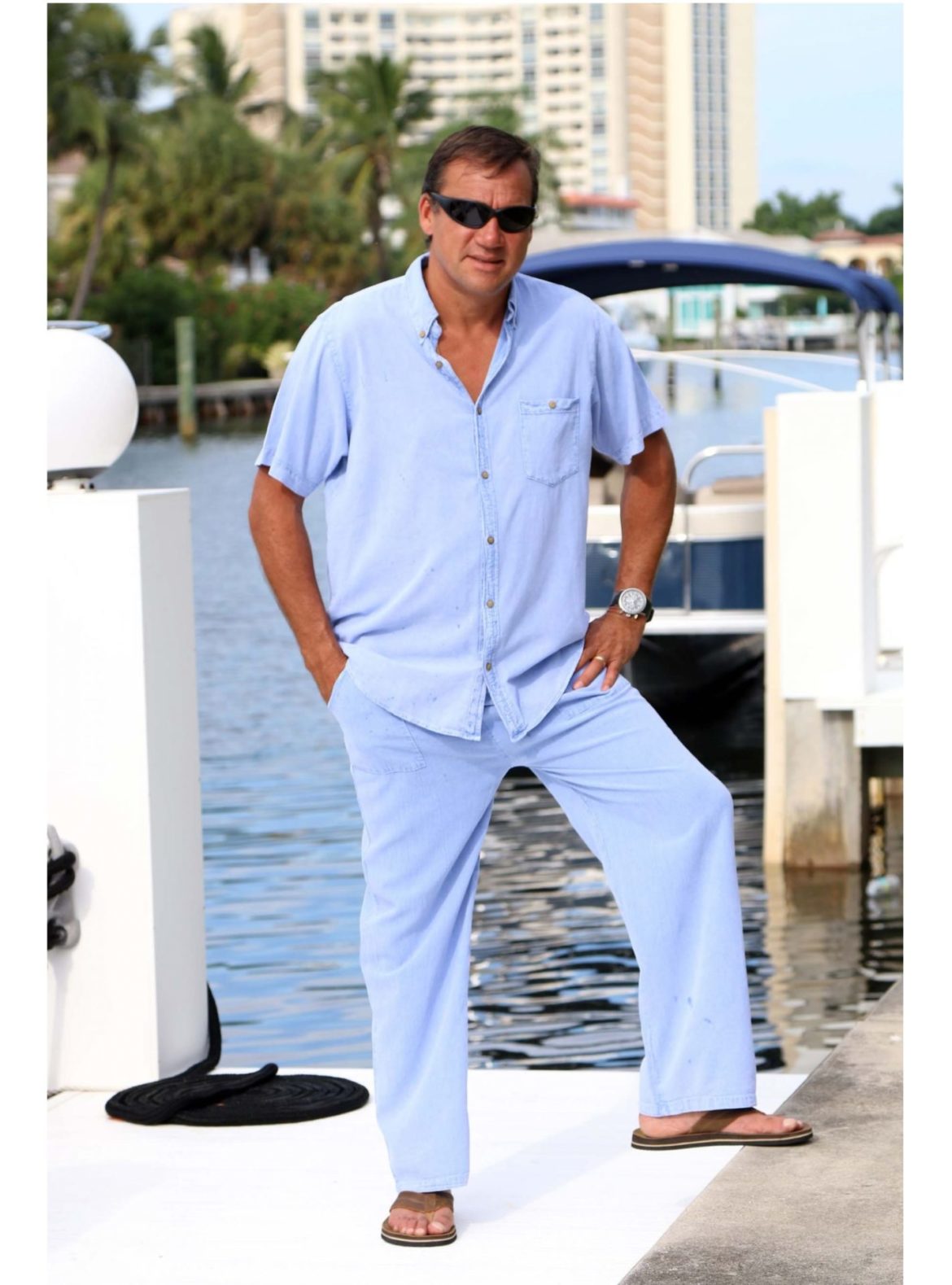 Mens-Cotton-Oasis-pants-Light-Denim-Model-on-Dock-full-view-of-pants-with-shirt