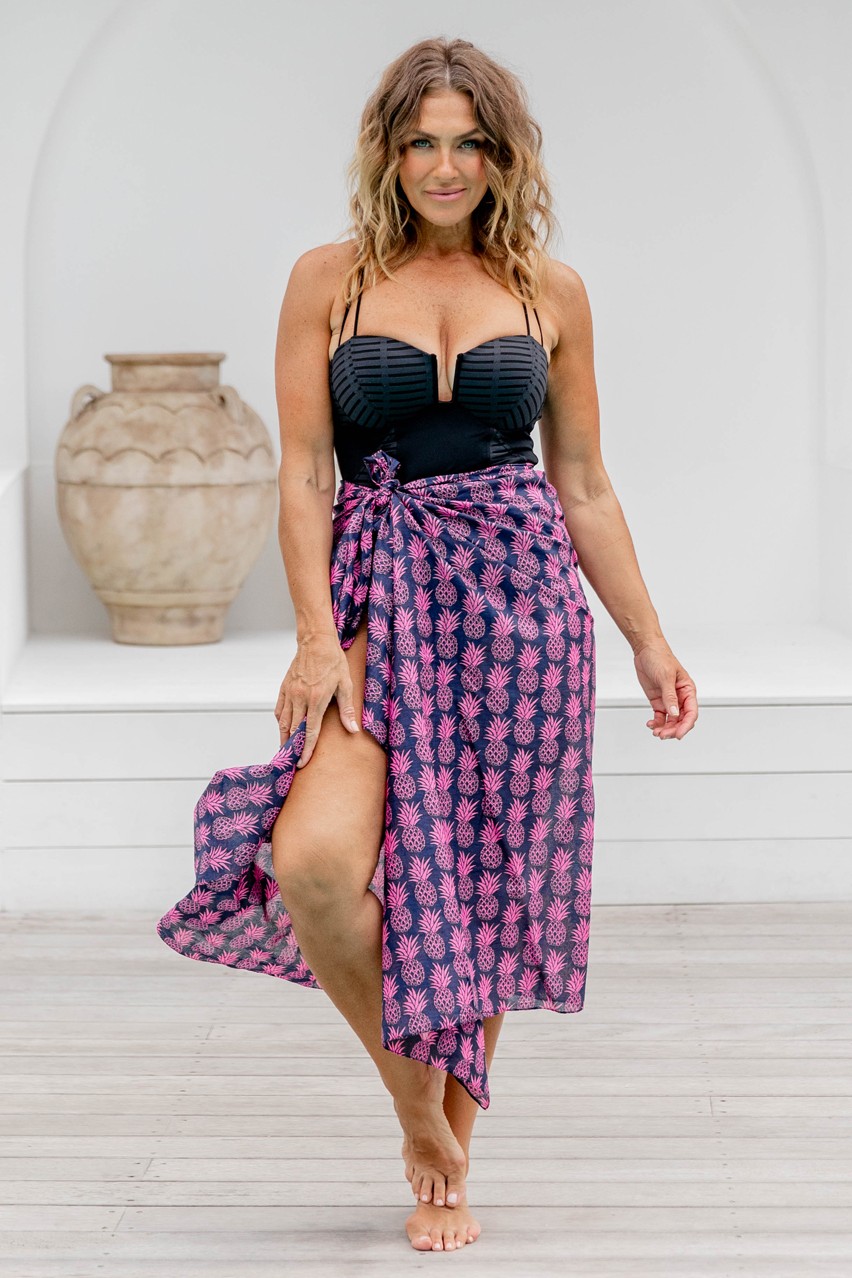 Sarong-Pineapple-Palooza-Navy-Model-standing-at-Beach-resort-feeling-sexy-in-her-cotton-sarong-on-poolside-deck