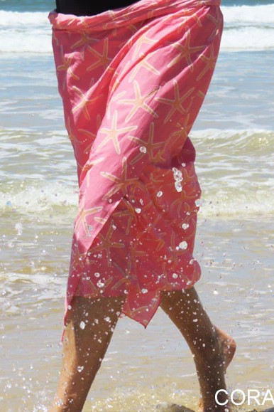 Sarong-cotton-beach-coverup-St-Barths-Coral-Model-walking-on-the-beach